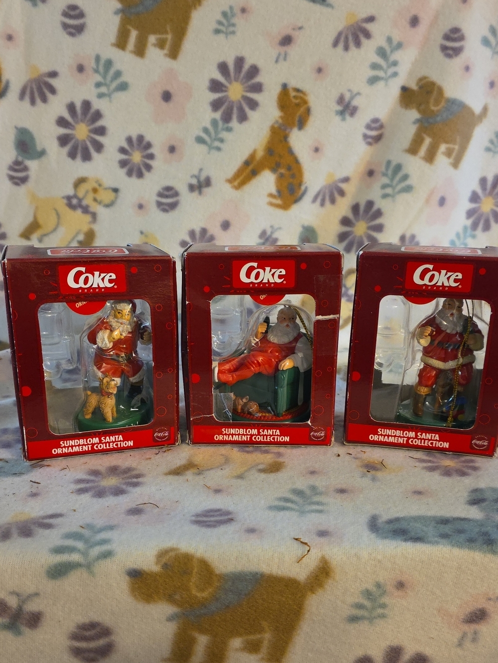 3 boxed Coca-Cola Sundblom Santa Ornament Collection figurines